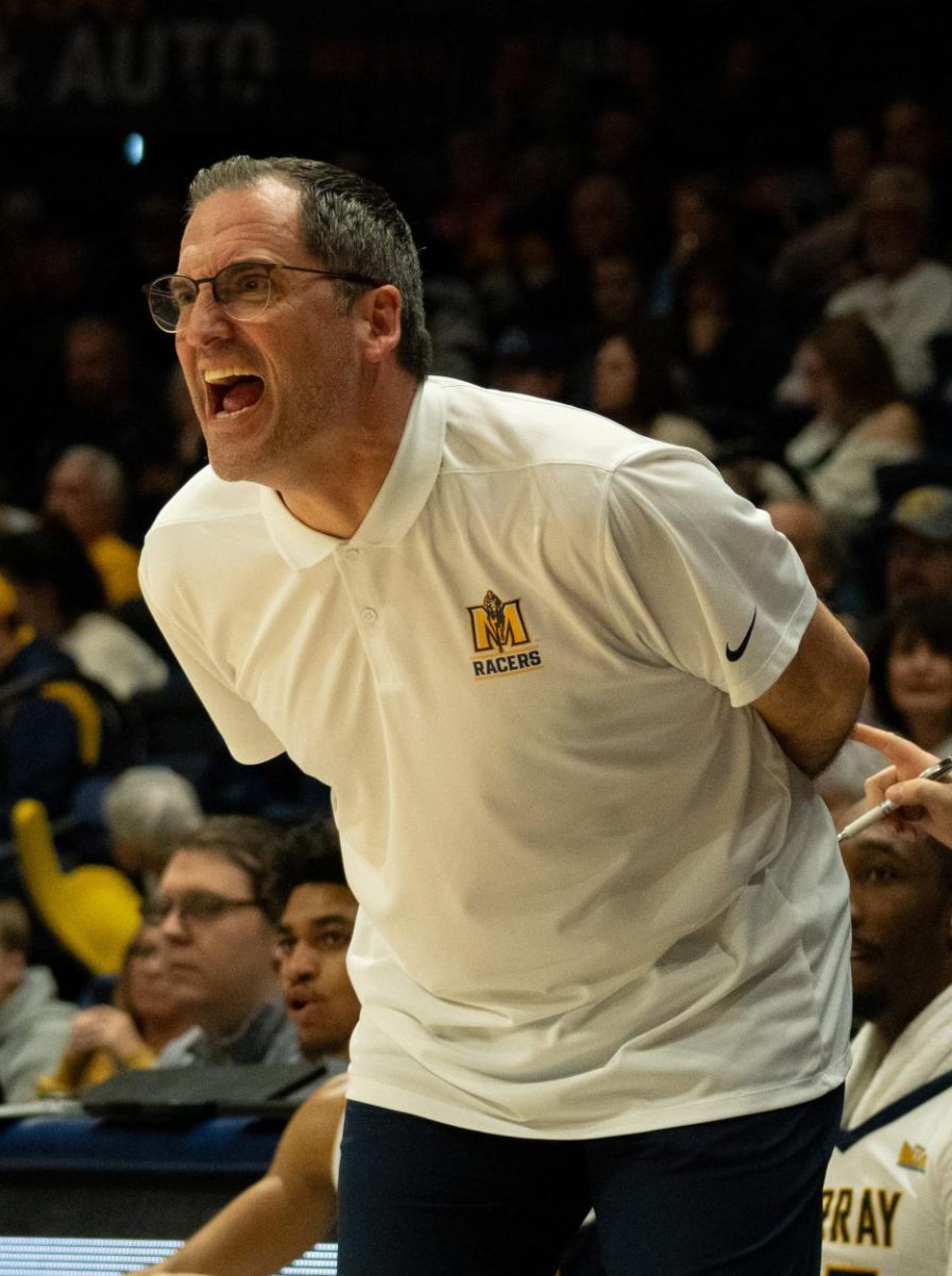 Head Coach Steve Prohm yells to his players on the court. 