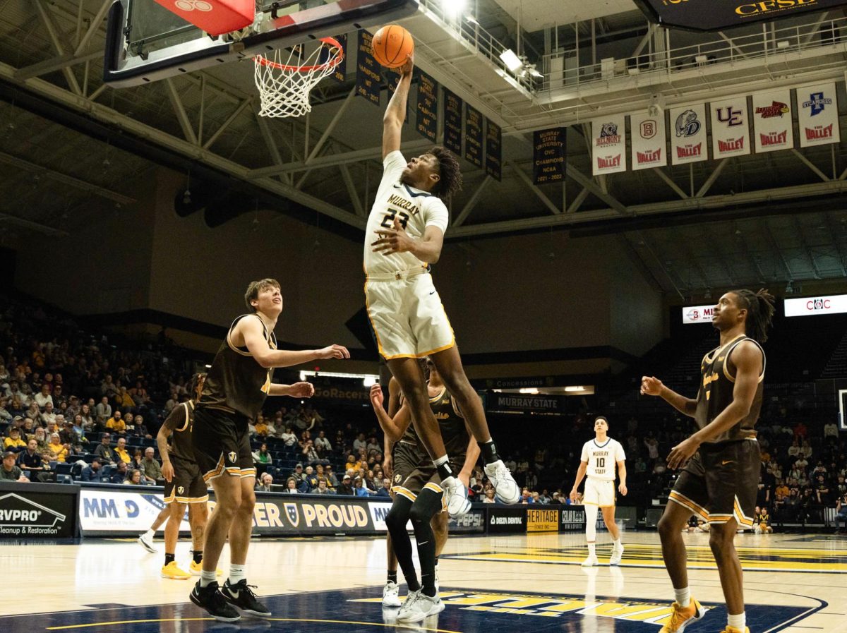 Junior forward Nick Ellington goes for a dunk. 