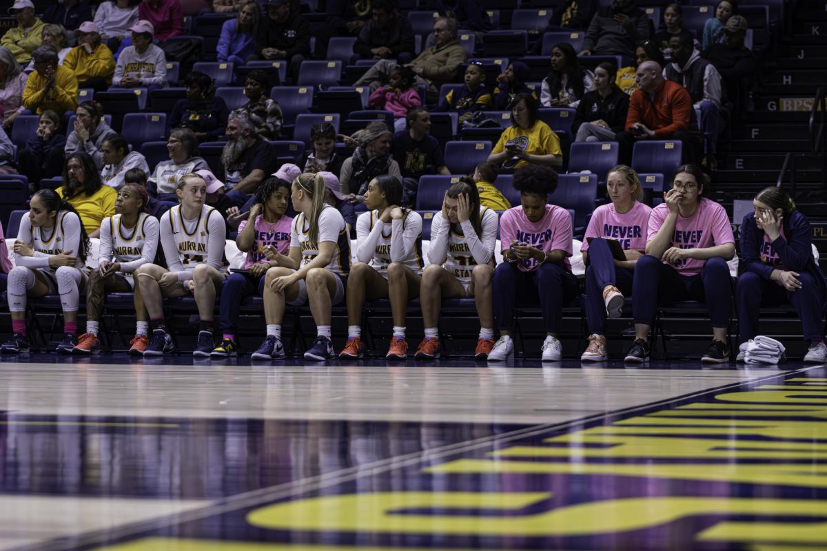 Murray State bench looking defeated in the final seconds of play after UNI takes the lead. 