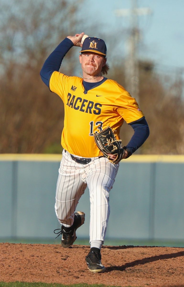 Junior Kane Elmy comes into the game to pitch for the Racers.