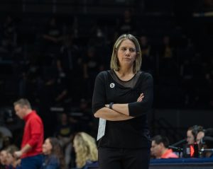 Women’s head coach Rechelle Turner looks toward the bench in disappointment during the Racers’ game against the Belmont Bruins.