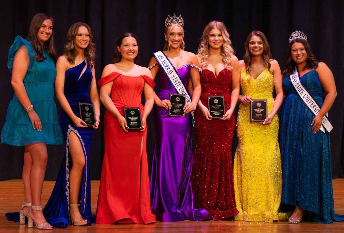 The top five contestants of the Ms. MSU pageant pose together with Culp and McGowan.