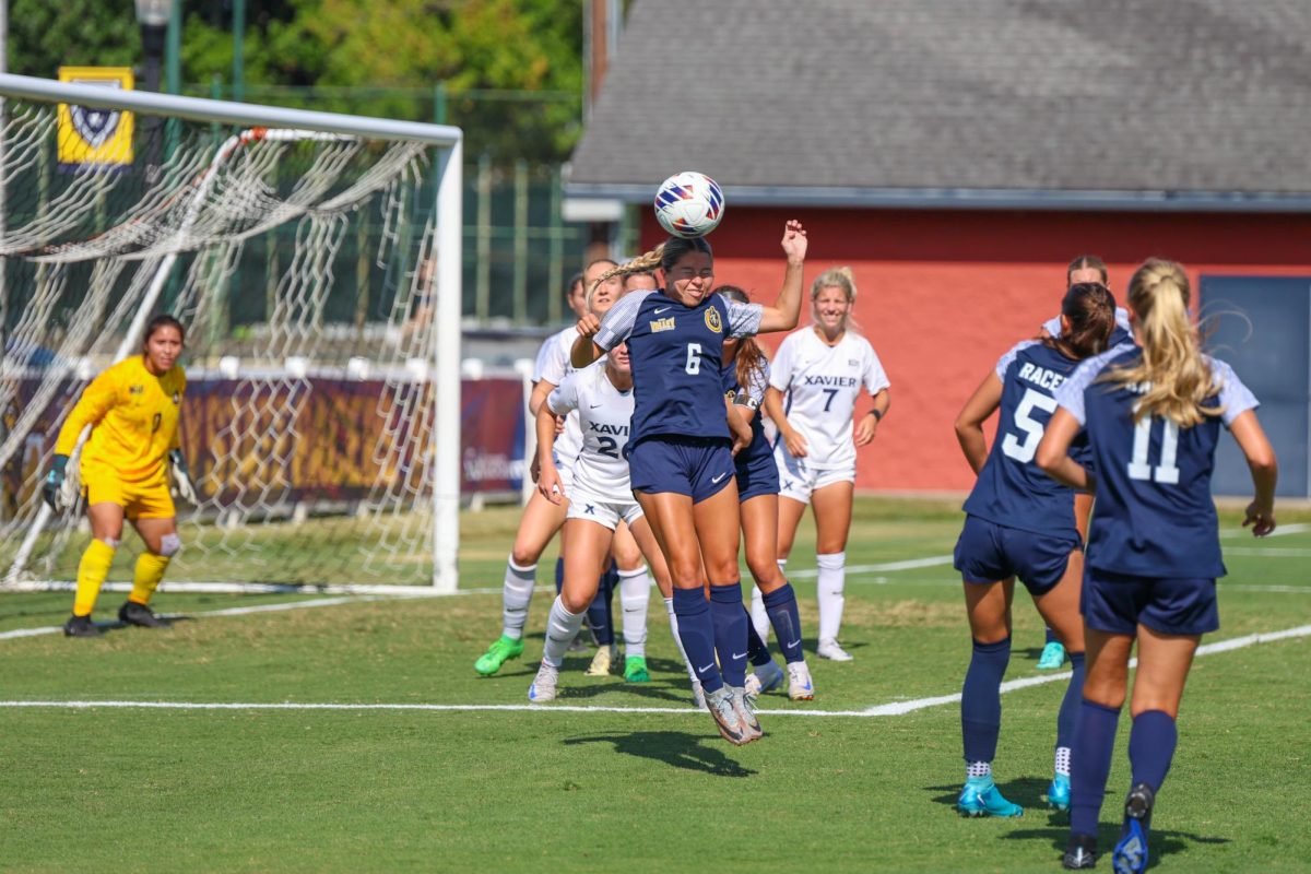 Freshman midfielder Natalie Miller goes for a header. 