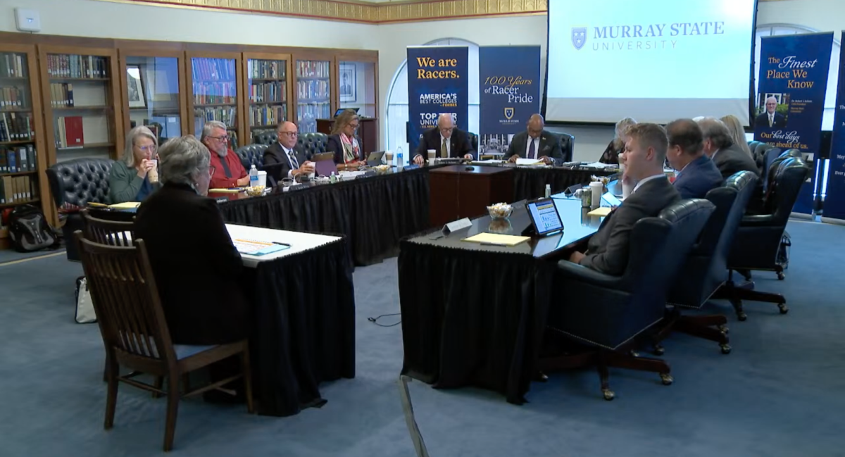 The Board of Regents conducting their quarterly meeting at Pogue Library.