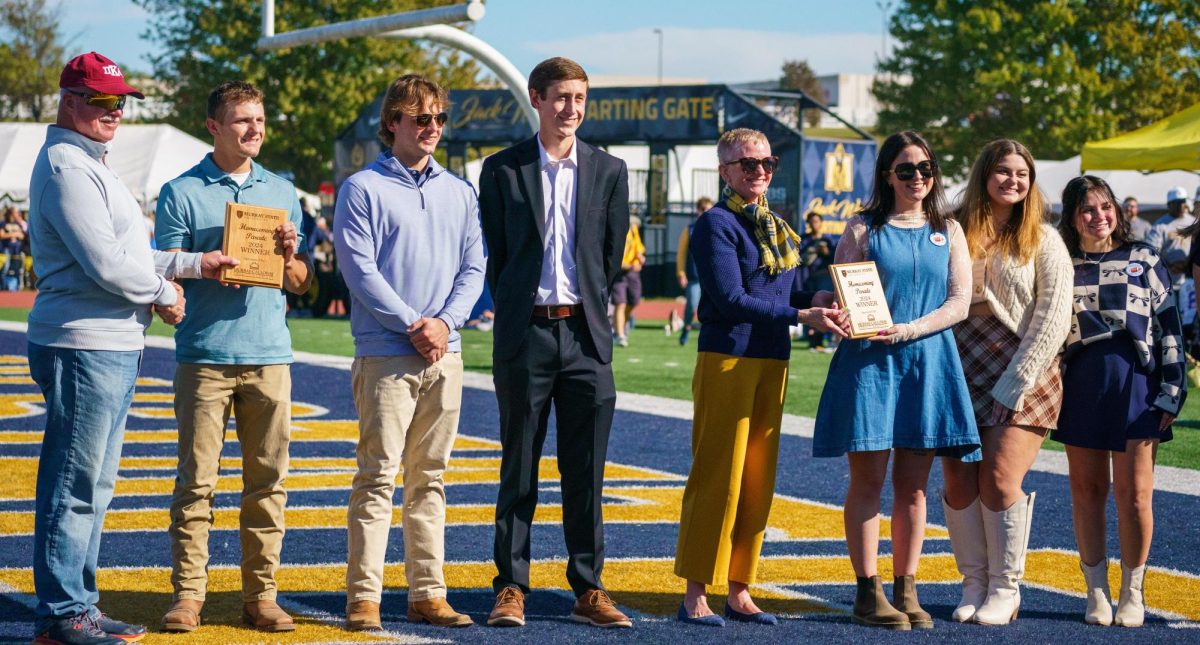 Pi Kappa Alpha and Kappa Delta are announced as the winners of the float decorating contest.