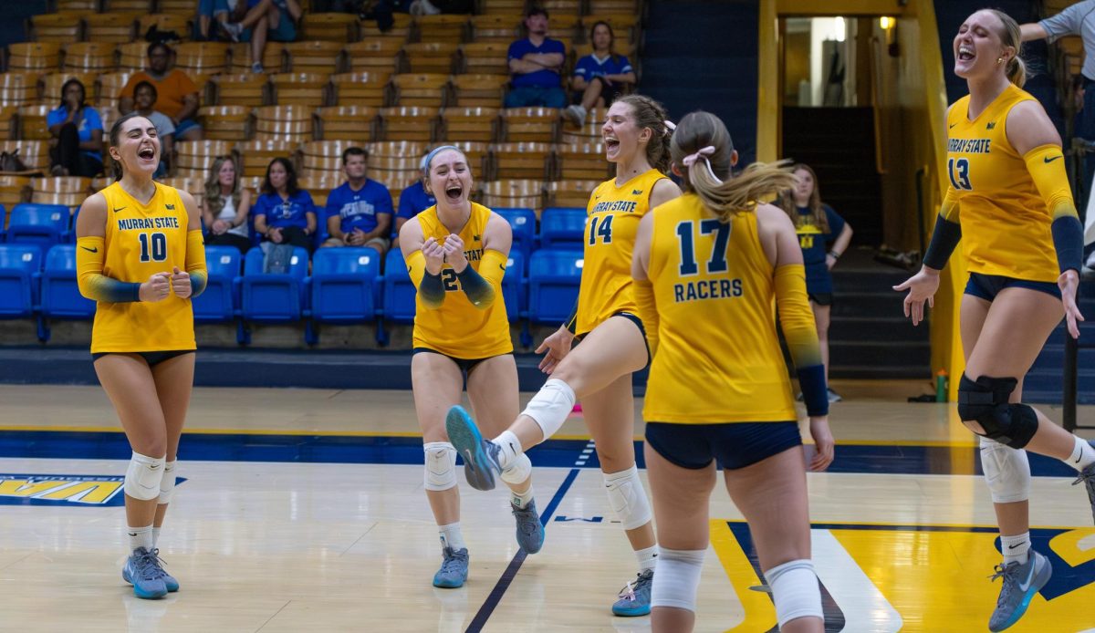 The Racers celebrate a point.