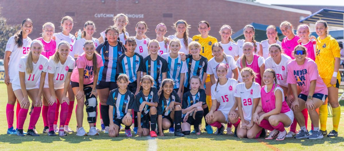 The team poses for a picture with the U11 Invictus FC from Mayfield. 