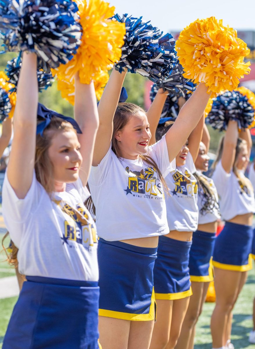 Racer cheerleaders cheer on the Racers. 