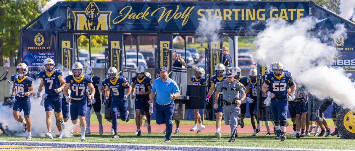 Head coach Jody Wright leads the team as they charge out the starting gates. 