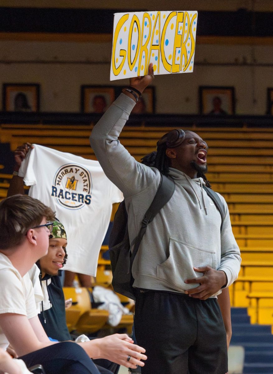 Students cheer on the Racers. 