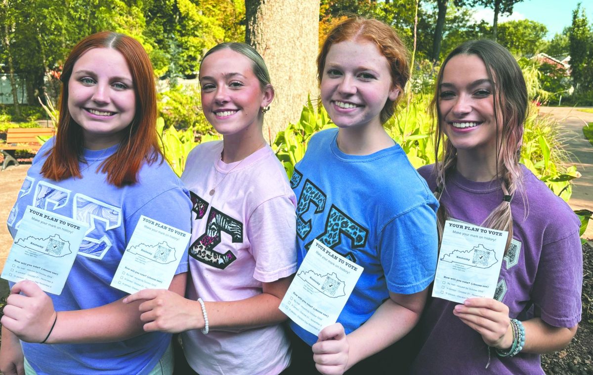 Tri-Sigma sorority members showcase their dedication to vote in the upcoming election. 