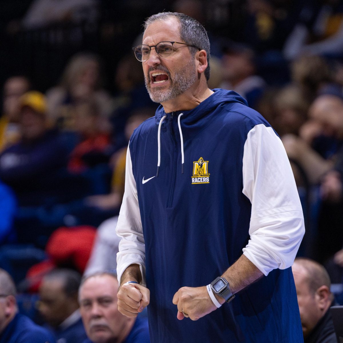 Head coach Steve Prohm yells to his players on the court. 