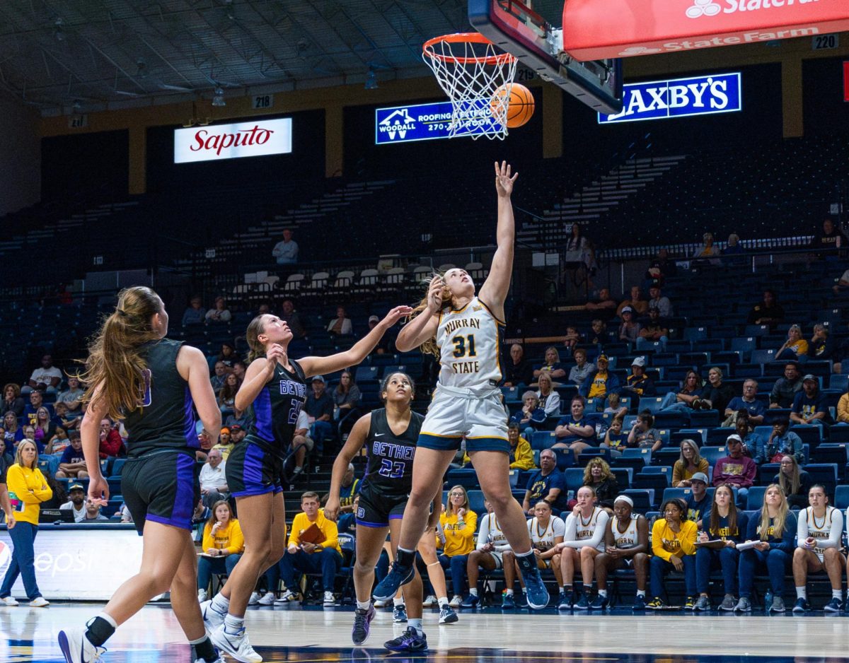 Women's basketball dominate in home opener