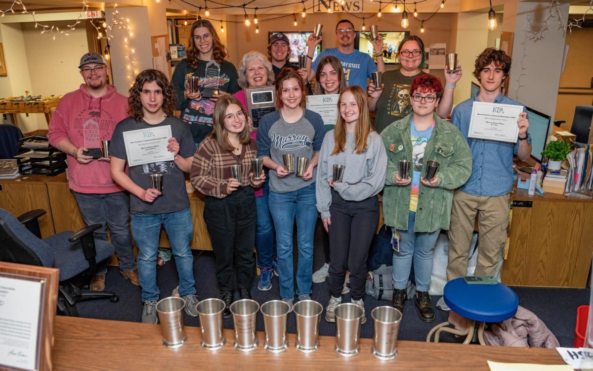 The Murray State News staff gather together to celebrate the awards won at the Kentucky Press Association convention. 