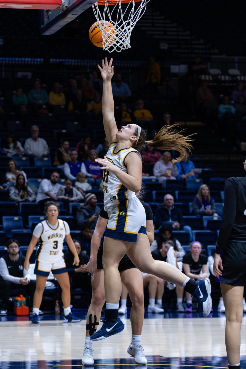 Graduate student forward Katelyn Young goes for a layup. 