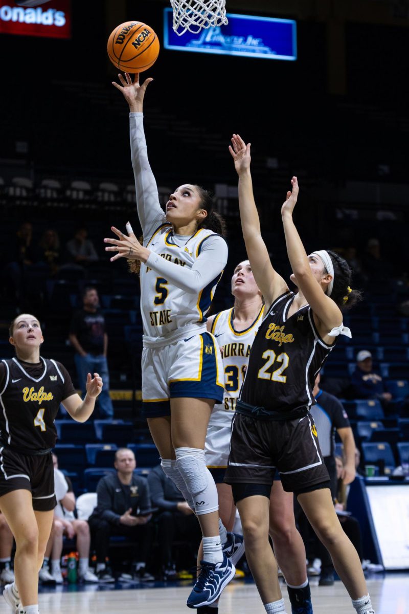 Senior guard Trinity White goes for a layup. 