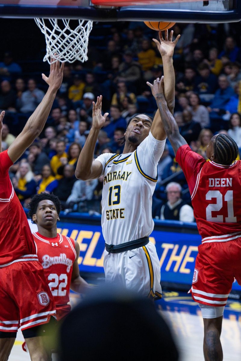 Junior forward Alden Applewhite gets fouled on a layup attempt. 