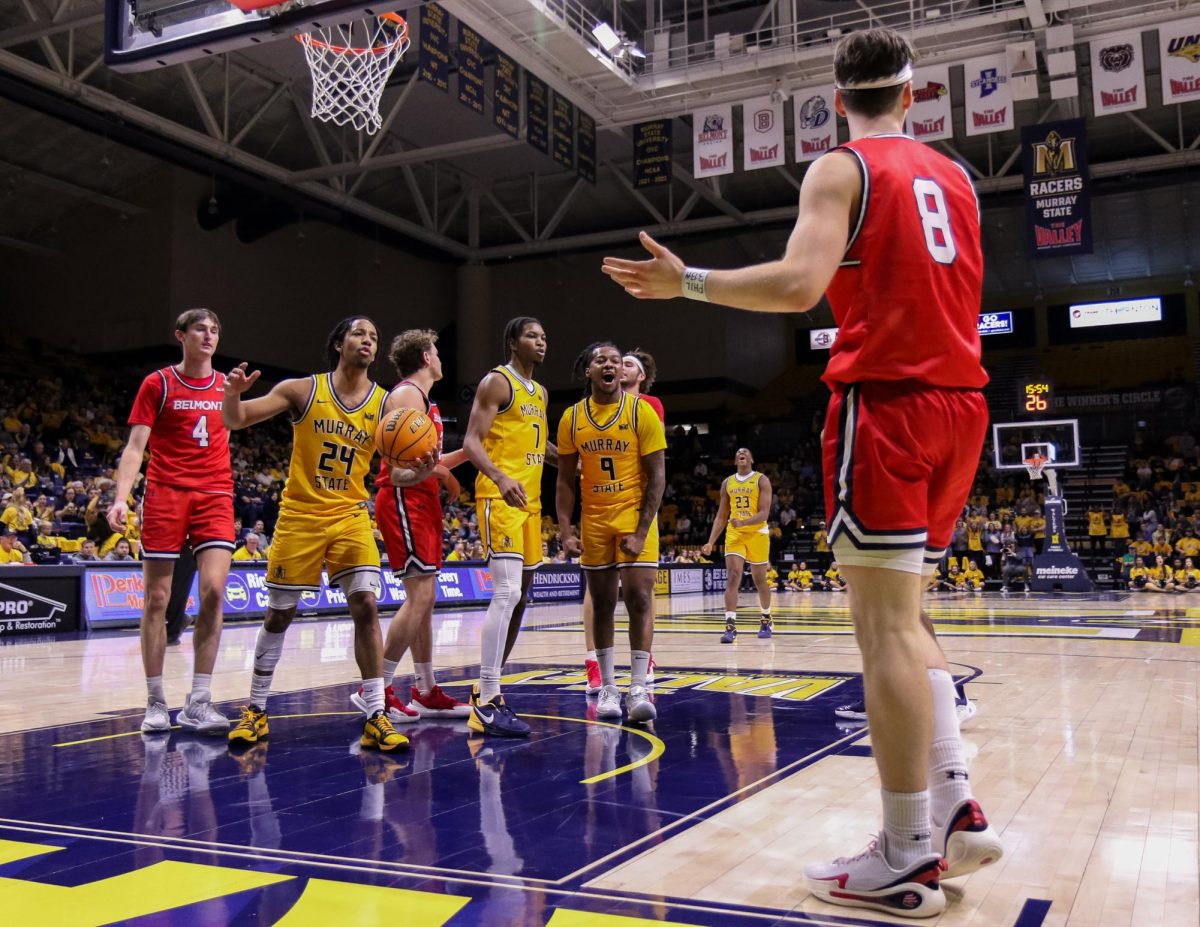 Senior guard Terence Harcum celebrates after making a shot and drawing a foul. 