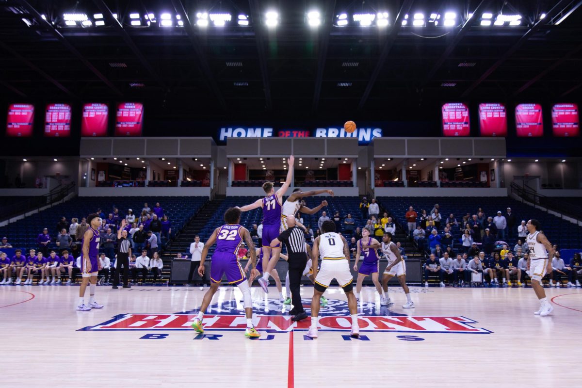 Senior forward Nick Ellington wins the opening tip-off. 