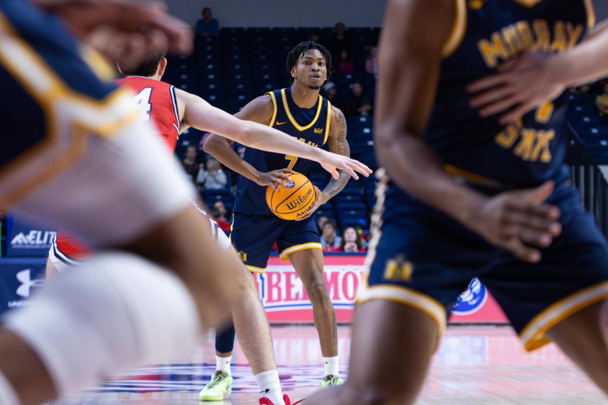 Senior guard AJ Ferguson surveys the defense.