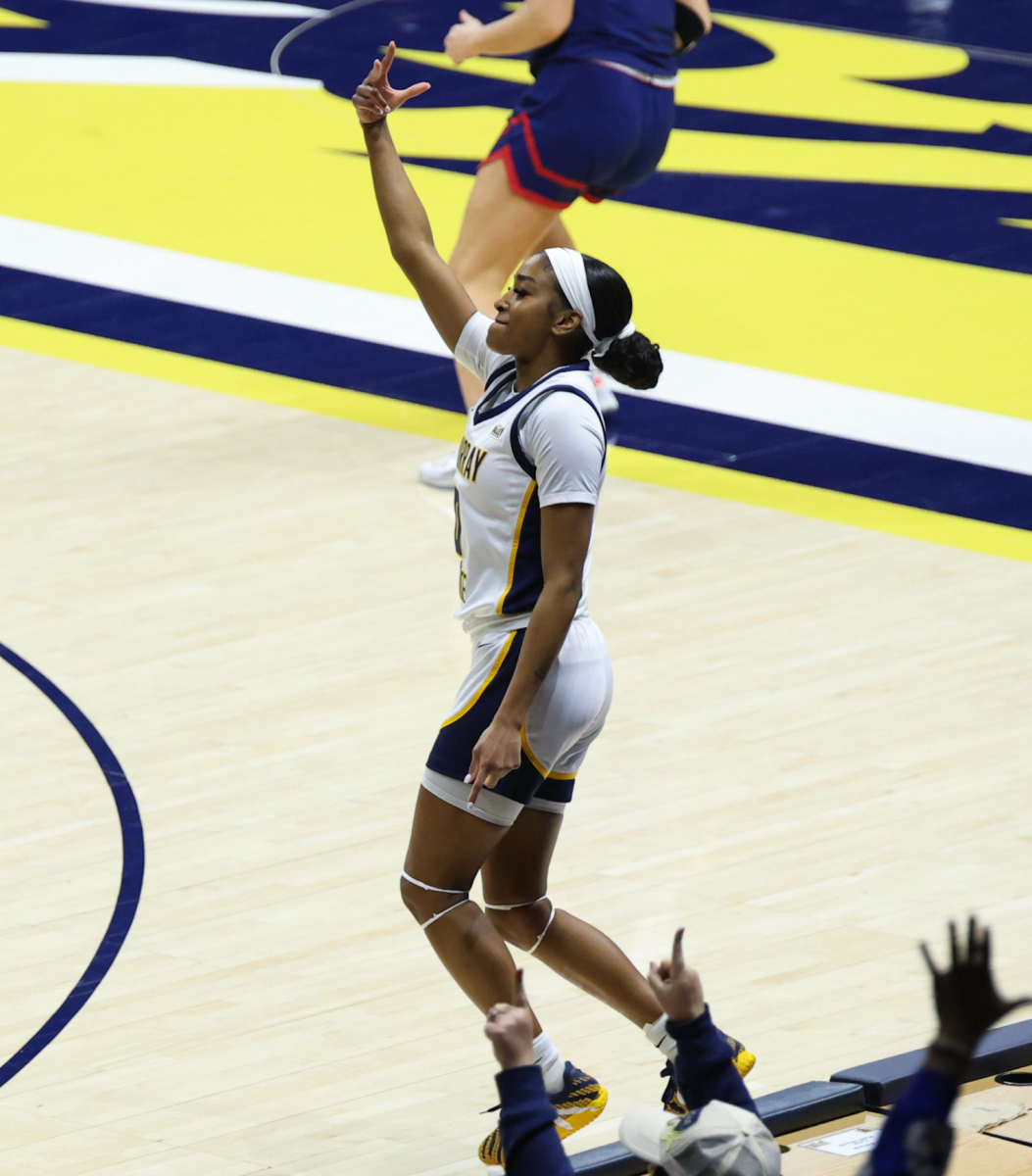 Sophomore guard Jada Cook celebrates a three-pointer against Belmont.