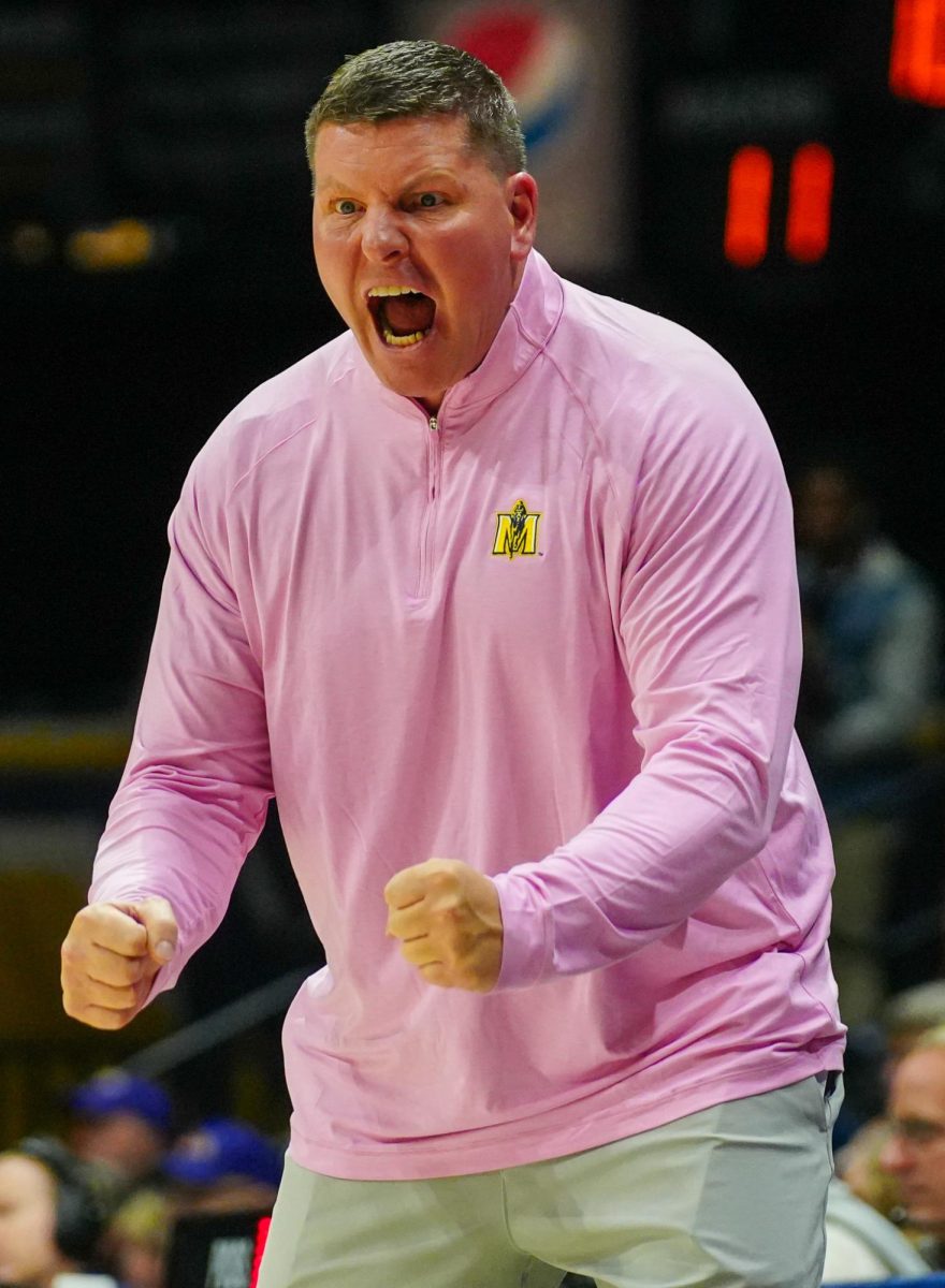 Coach Ryan Miller yelling during the game. 