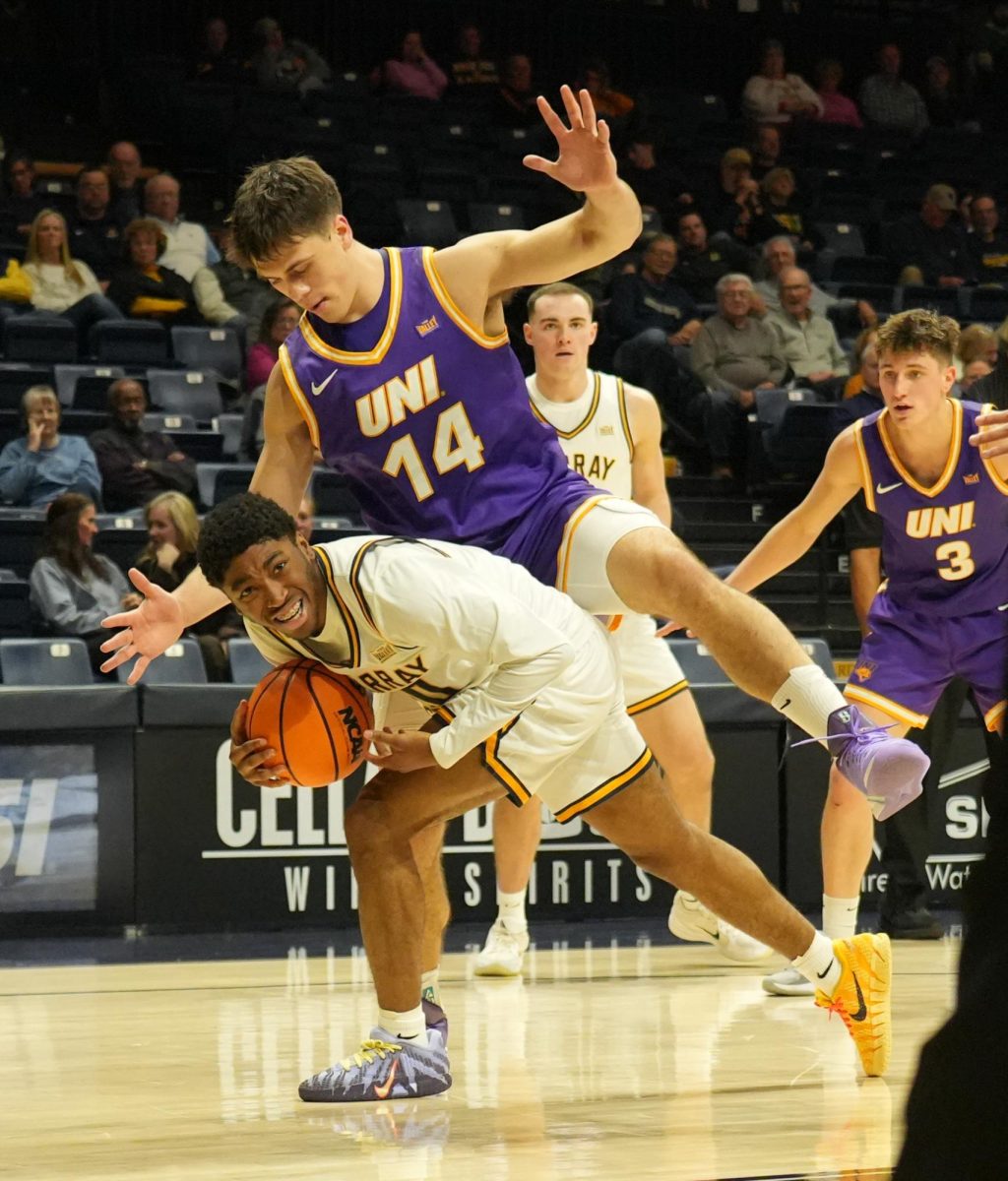 Sophomore guard KJ Tenner showing reaction to the referee about the current play.