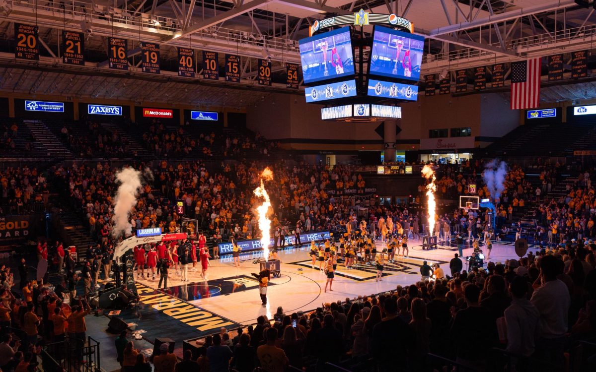 Pyrotechnics fire as the Racers starting five is announced.