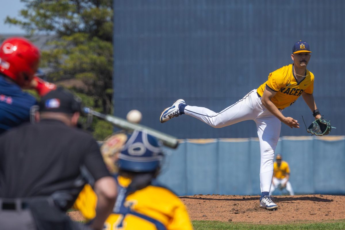 Senior pitcher Nic Schutte delivers a pitch to a UIC batter.