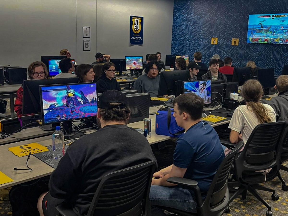 Multiple competitors play Super Smash Bros. Ultimate against each other. Photo provided by Connor Wolfe.