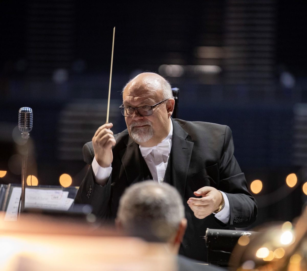 Todd Hill conducts a performance for the Murray State centennial gala.